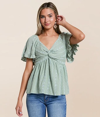 Angie Twisted Front Peplum Top