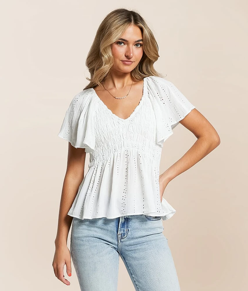 Angie Eyelet Smocked Peplum Top