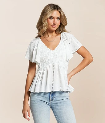 Angie Eyelet Smocked Peplum Top