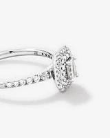 0.55 Carat TW Emerald Diamond Halo Baguette Side Accent Engagement Ring in 14kt White Gold