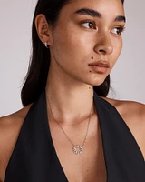 Boucles d’oreilles Huggie en zircone cubique en argent sterling