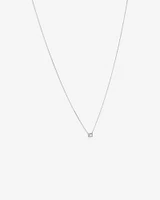 0.23 Carat TW Emerald Diamond Halo Pendant in 10kt White Gold