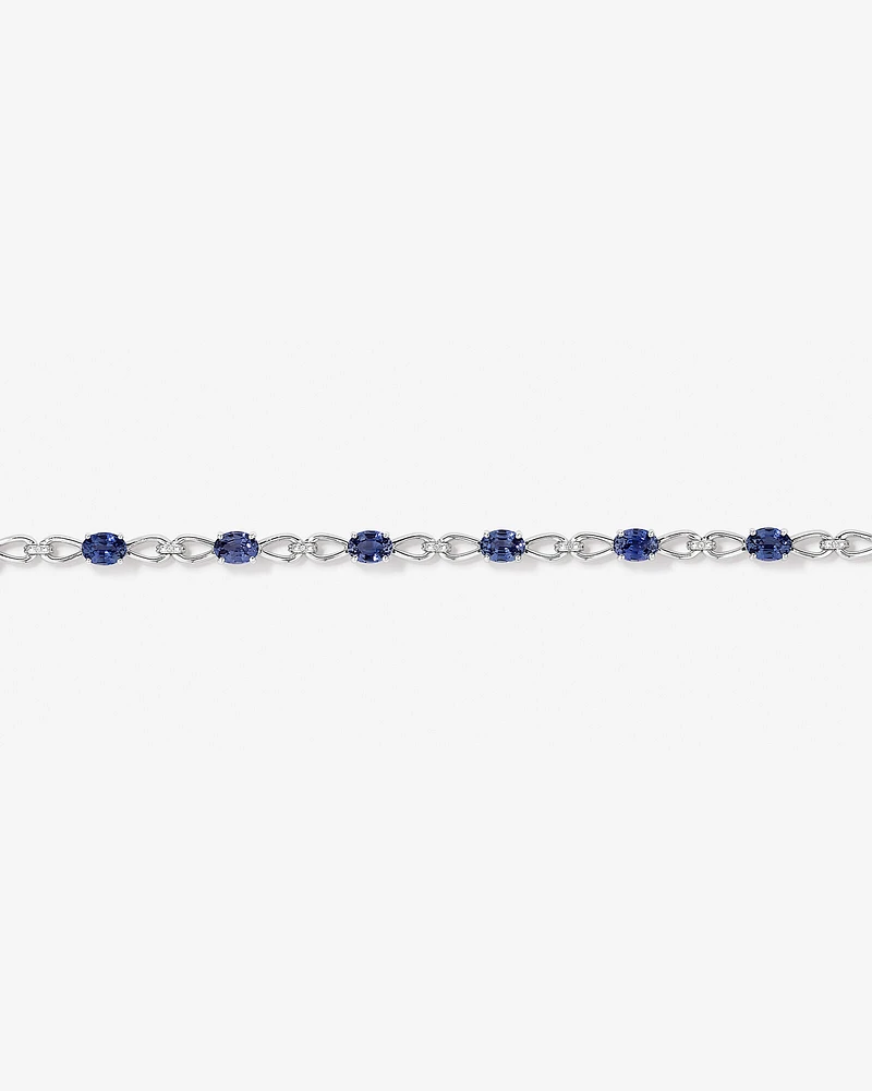 Oval Cut Blue Created Sapphire Gemstone and Diamond Bracelet in Sterling Silver