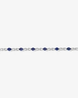Oval Cut Blue Created Sapphire Gemstone and Diamond Bracelet in Sterling Silver