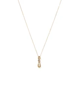 0.07 Carat TW Diamond Knots Pendant in 10kt Yellow Gold