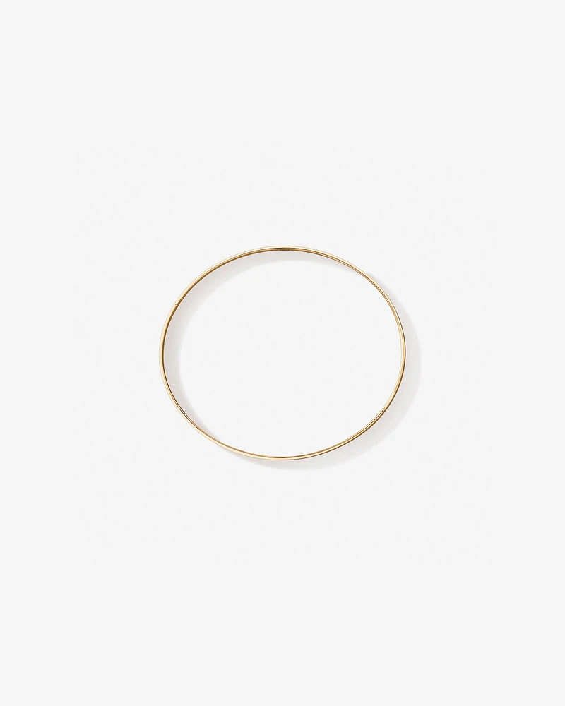 65mm (2.5") 7.7mm Width Solid Oval Bangle in 10kt Yellow Gold