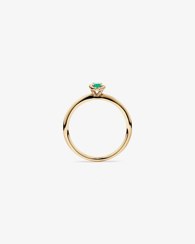 Oval Cut Green Emerald Gemstone and 0.08 Carat TW Diamond Halo Ring in 10kt Yellow Gold
