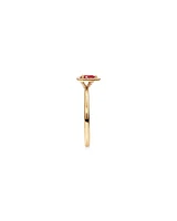 Pear Cut Red Ruby Gemstone and 0.08 Carat TW Diamond Halo Ring in 10kt Yellow Gold