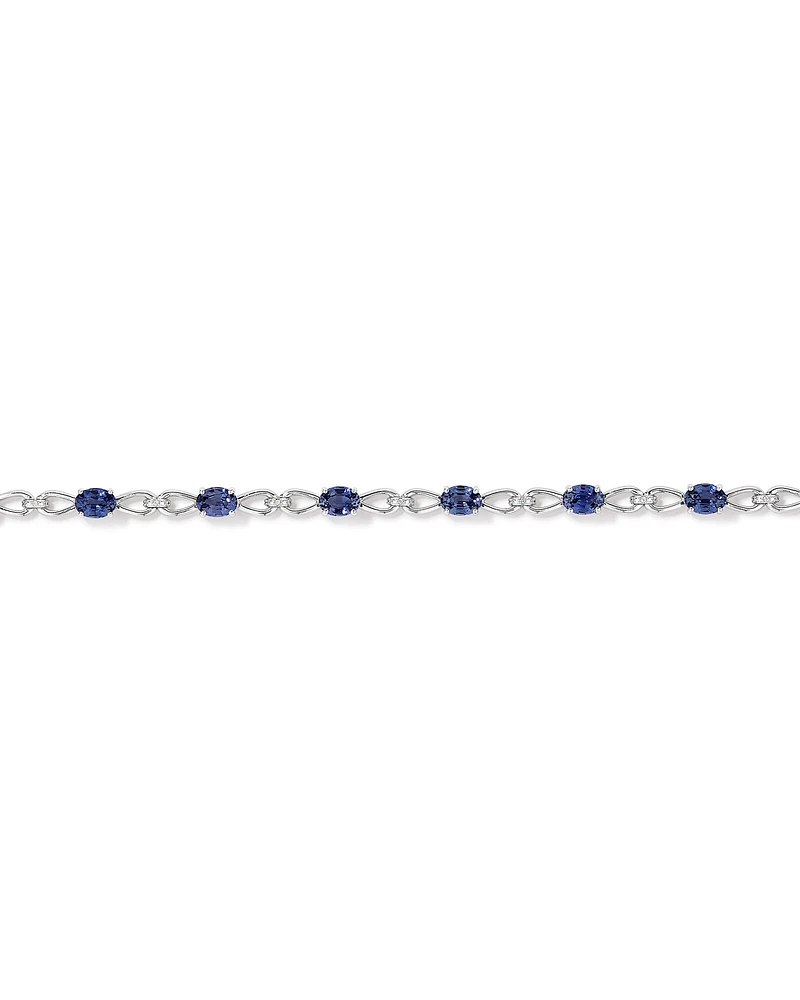 Oval Cut Blue Created Sapphire Gemstone and Diamond Bracelet in Sterling Silver