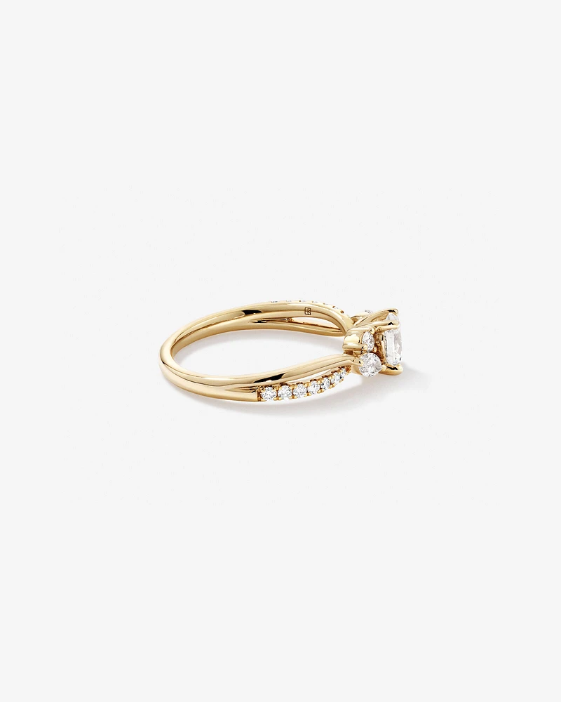 0.83 Carat TW Oval and Marquise Twist Engagement Ring in 14kt Yellow Gold