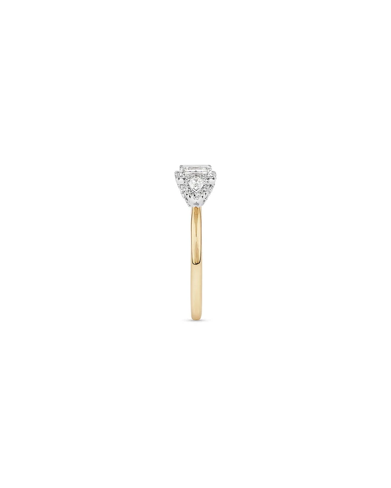 0.69 Carat TW Three Stone Emerald and Pear Cut Diamond Halo Engagement Ring in 14kt Yellow and White Gold