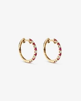 0.22 Carat TW Diamond and Created Ruby Huggie Hoop Earrings in 10kt Yellow Gold