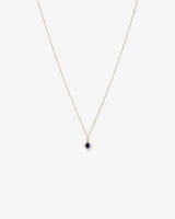 Pear Cut Created Sapphire and Diamond Halo Pendant Necklace in 10kt Yellow Gold