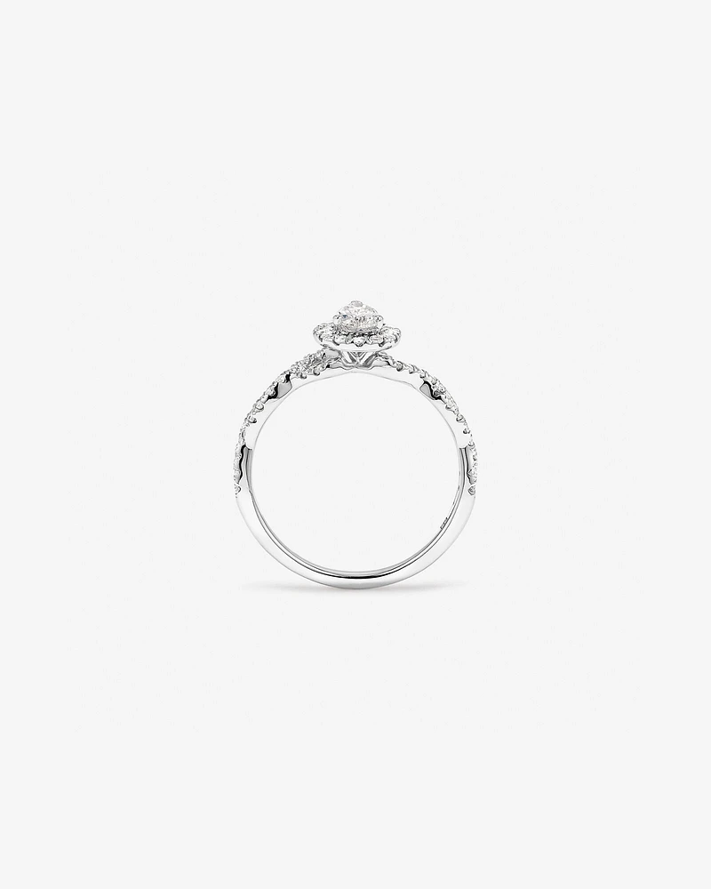 0.75 Carat TW Pear Cut Diamond Halo Twist Engagement Ring in 14kt White Gold