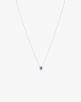Emerald Cut Blue Tanzanite and 0.17 Carat TW Diamond Halo Pendant in 14kt White Gold