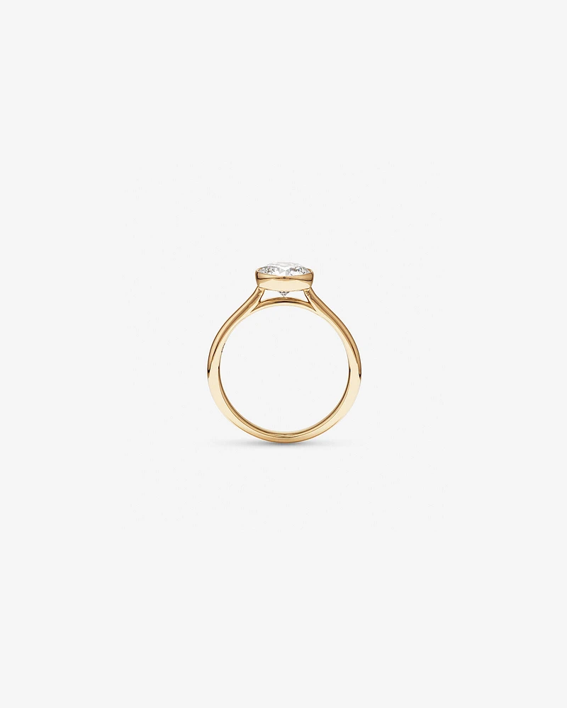 1.25 Carat TW Round Brilliant Laboratory-Grown Diamond Solitaire Bezel Set Engagement Ring in 14kt Yellow Gold