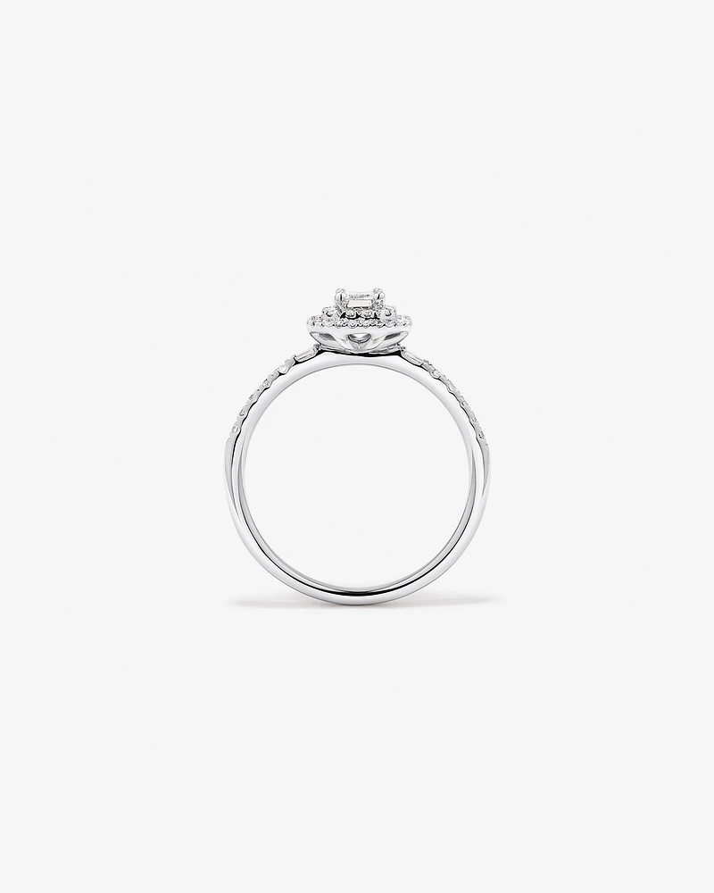 0.55 Carat TW Emerald Diamond Halo Baguette Side Accent Engagement Ring in 14kt White Gold