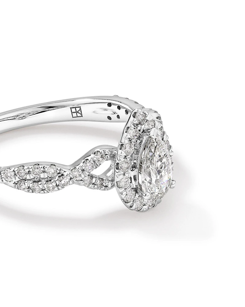 0.75 Carat TW Pear Cut Diamond Halo Twist Engagement Ring in 14kt White Gold