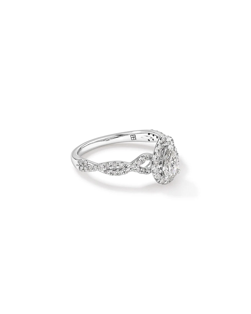 0.75 Carat TW Pear Cut Diamond Halo Twist Engagement Ring in 14kt White Gold
