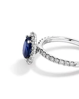 Oval Cut Blue Sapphire Gemstone and 0.60 Carat TW Diamond Halo Ring in 14kt White Gold