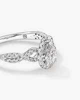 0.75 Carat TW Pear Cut Diamond Halo Twist Engagement Ring in 14kt White Gold