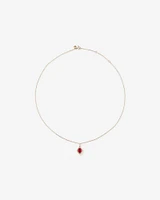 Oval Cut Created Ruby and Diamond Halo Pendant Necklace in 10kt Yellow Gold