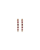 0.22 Carat TW Diamond and Created Ruby Huggie Hoop Earrings in 10kt Yellow Gold