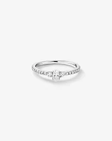 0.40 Carat TW Oval and Round Brilliant Three Stone Side Accent Engagement Ring in 14kt White Gold