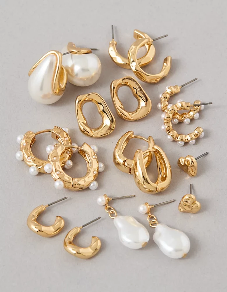 Lot de neuf paires de boucles d’oreille dorées et à perles AEO