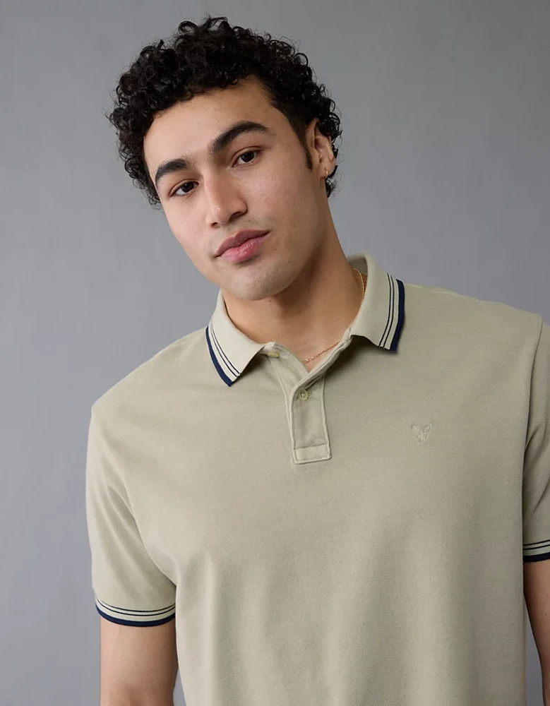 Polo extensible à bordures contrastantes en piqué AE
