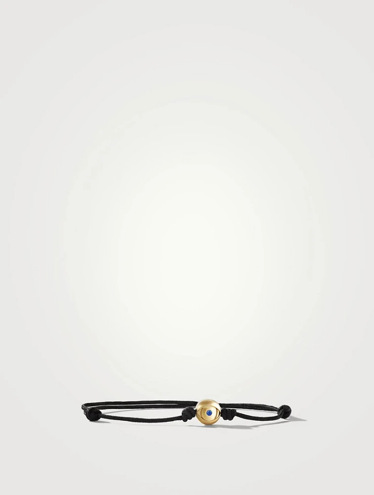 Evil Eye Black Cord Bracelet With 18k Yellow Gold And Sapphire