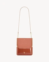 CASSANDRE phone case in patent leather
