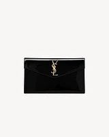 UPTOWN POUCH IN PATENT LEATHER