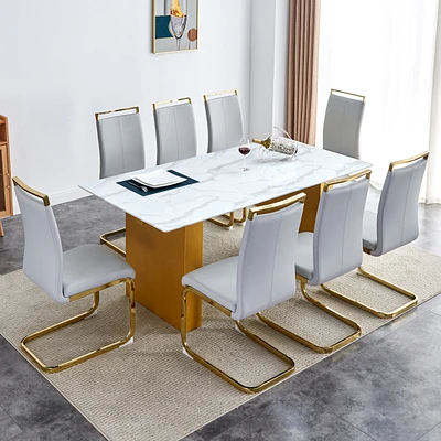 Table and chair set.Large modern rectangular table with 0.4 inch patterned glass tabletop and large Mdf table legs.Comes with 8 chairs with faux leath