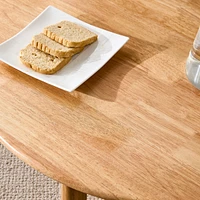 Elegant wooden coffee table with faux rattan accents