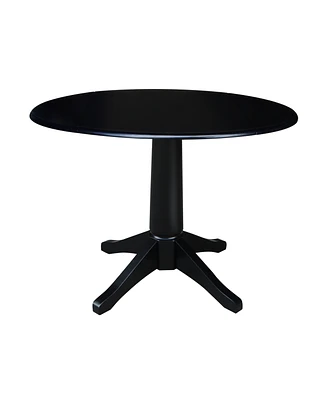 International Concept 42" Round Dual Drop Leaf Pedestal Table