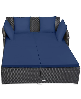 Skonyon Spacious Outdoor Rattan Daybed with Upholstered Cushions and Pillows