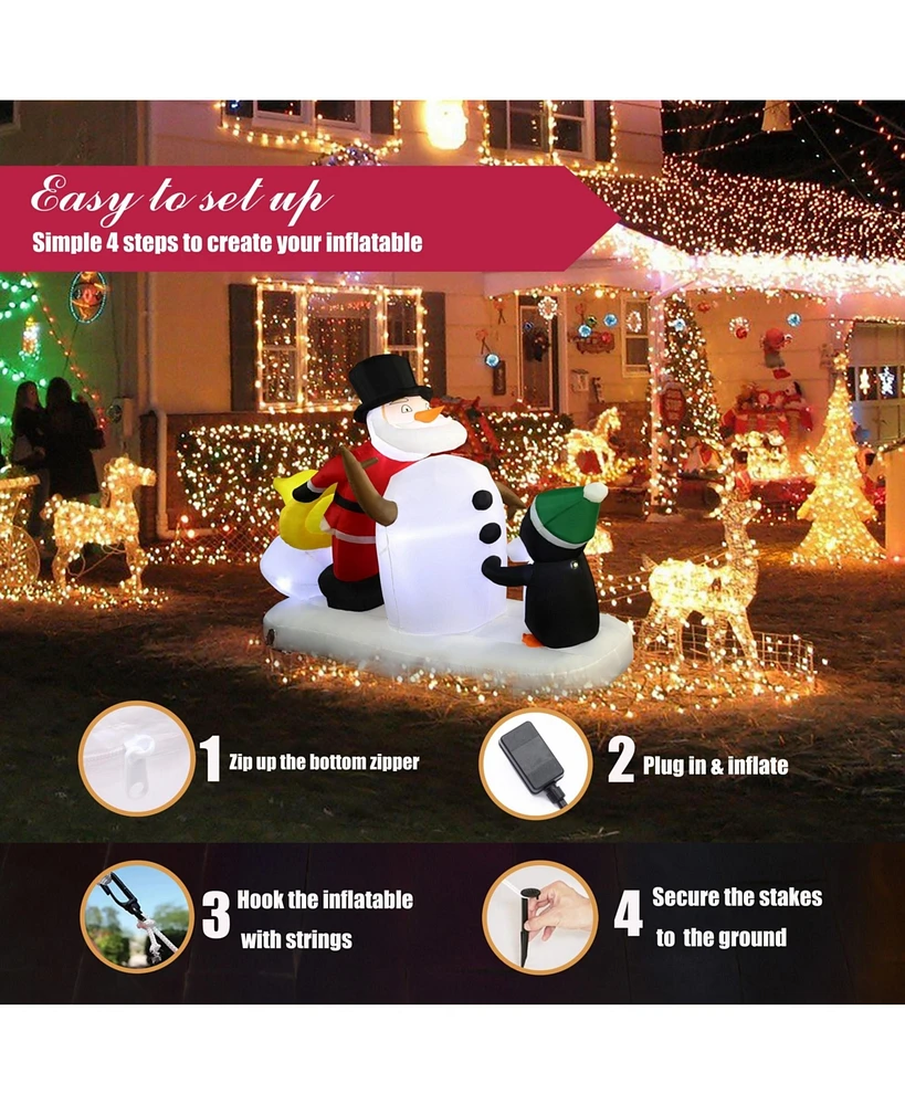 LuxenHome 5.9 Ft Long Santa Snowman and Penguin Inflatable with Lights