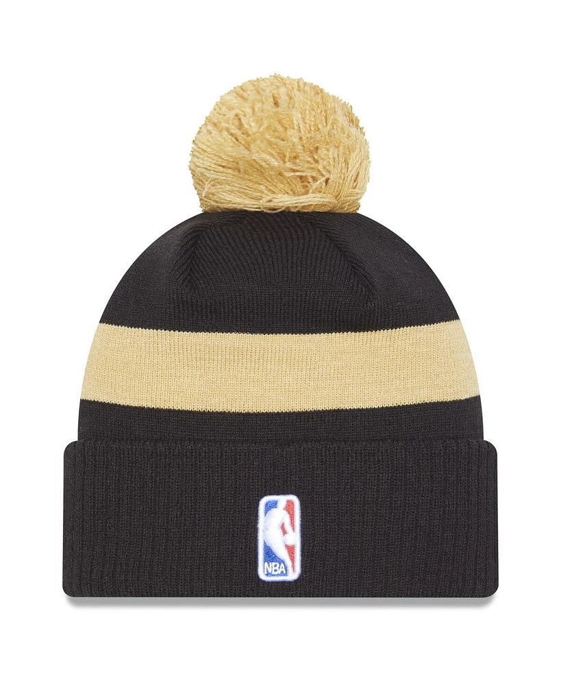 Men's New Era Black Toronto Raptors 2022/23 City Edition Official Cuffed Pom Knit Hat