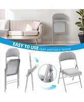 Skonyon Outdoor/Indoor Grey Vinyl Padded Folding Dining Chair (Set of 4)