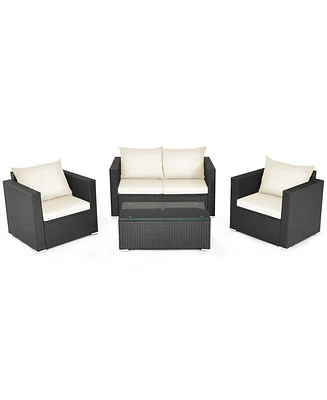 4 Pieces Patio Rattan Conversation Set with Padded Cushion and Tempered Glass Table