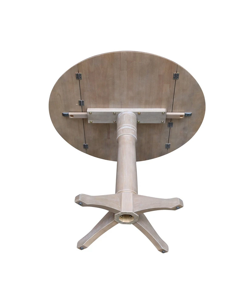 International Concepts 42" Round Dual Drop Leaf Pedestal Table