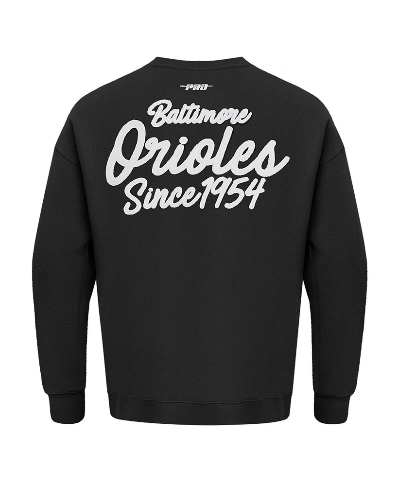 Pro Standard Men's Black Baltimore Orioles Paint The City Dropped Shoulder Pullover Sweatshirt
