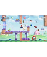 Nintendo Switch White Oled Console with Mario vs. Donkey Kong, Nso 12 Month Family Membership, MightySkins Console and Controller Skin Voucher