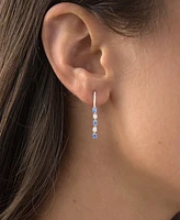 Dangling Huggie Earrings in Sterling Silver