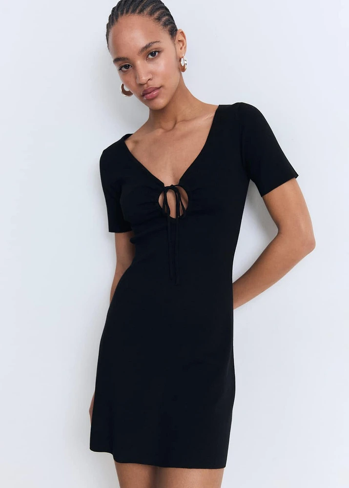 Knitted dress with bow neckline