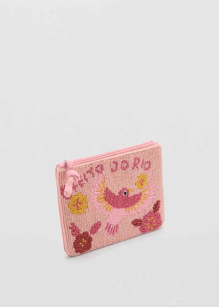 Toiletery bag with bead design