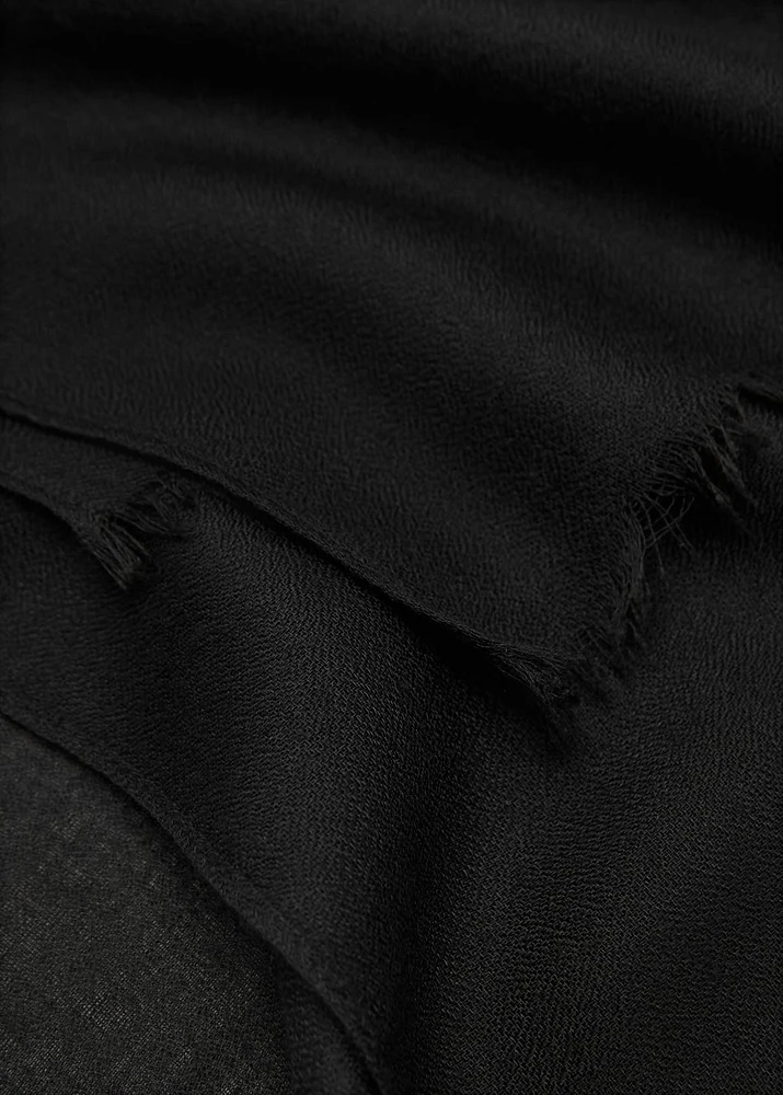 Plain shawl with frayed ends