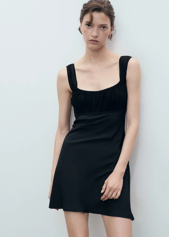 Short dress with ruched neckline