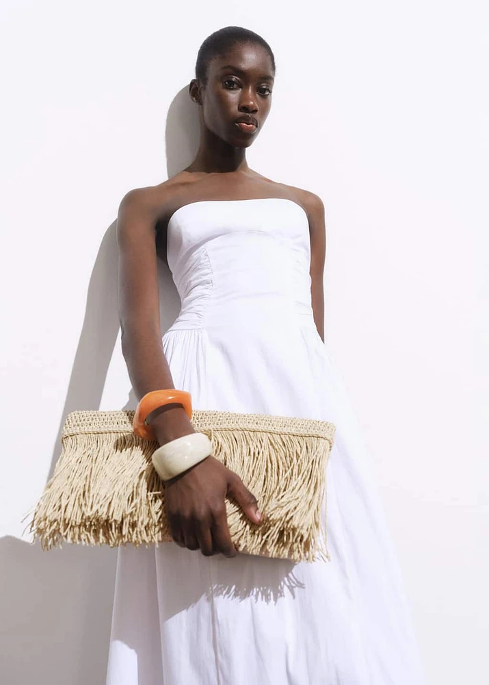 Natural fiber handbag with fringes
